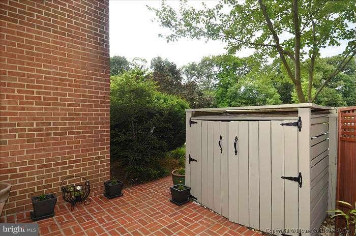 11711 Indian Ridge Road Reston, VA 20191 - Photo 3 of 30 Custom Brick Front Patio Walk Plus Storage