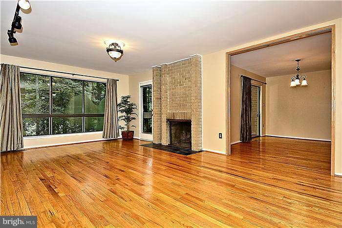 11711 Indian Ridge Road Reston, VA 20191 - Photo 5 of 30 Beautiful Views from Floor to Ceiling Windows