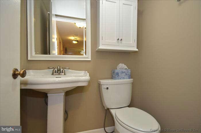 11711 Indian Ridge Road Reston, VA 20191 - Photo 10 of 30 Remodeled Main Level Halfbath