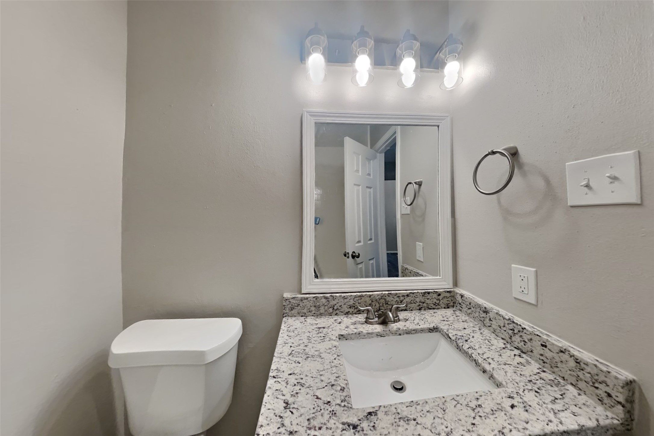 1511 Miller Avenue Katy, TX 77493 - Photo 20 of 23 a bathroom with a sink vanity and toilet