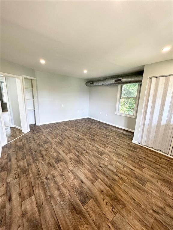 902 Robinson Street McKees Rocks, PA 15136 - Photo 22 of 31 a view of empty room with wooden floor and fan