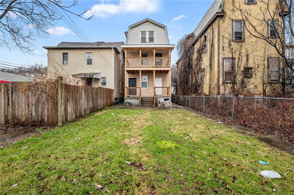 902 Robinson Street McKees Rocks, PA 15136 - Photo 27 of 31 a front view of a house with a yard