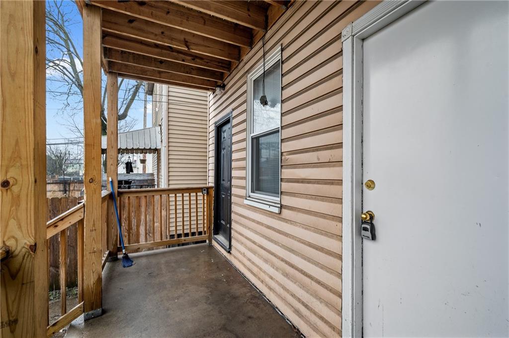 902 Robinson Street McKees Rocks, PA 15136 - Photo 4 of 31 a view of a balcony with door