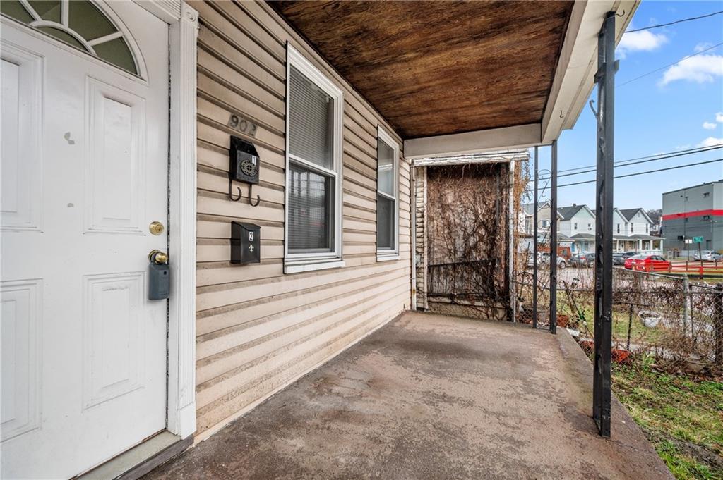 902 Robinson Street McKees Rocks, PA 15136 - Photo 6 of 31 a view of a house with a outdoor space