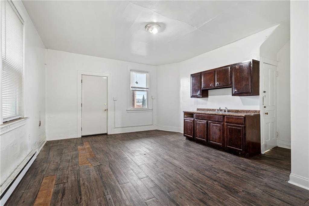 902 Robinson Street McKees Rocks, PA 15136 - Photo 9 of 31 a view of livingroom with furniture and wooden floor