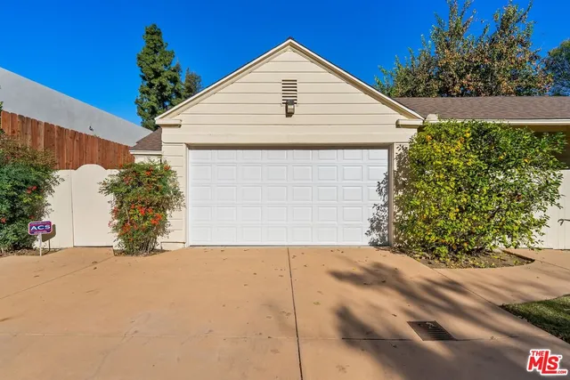 a view of an entryway with wooden floors