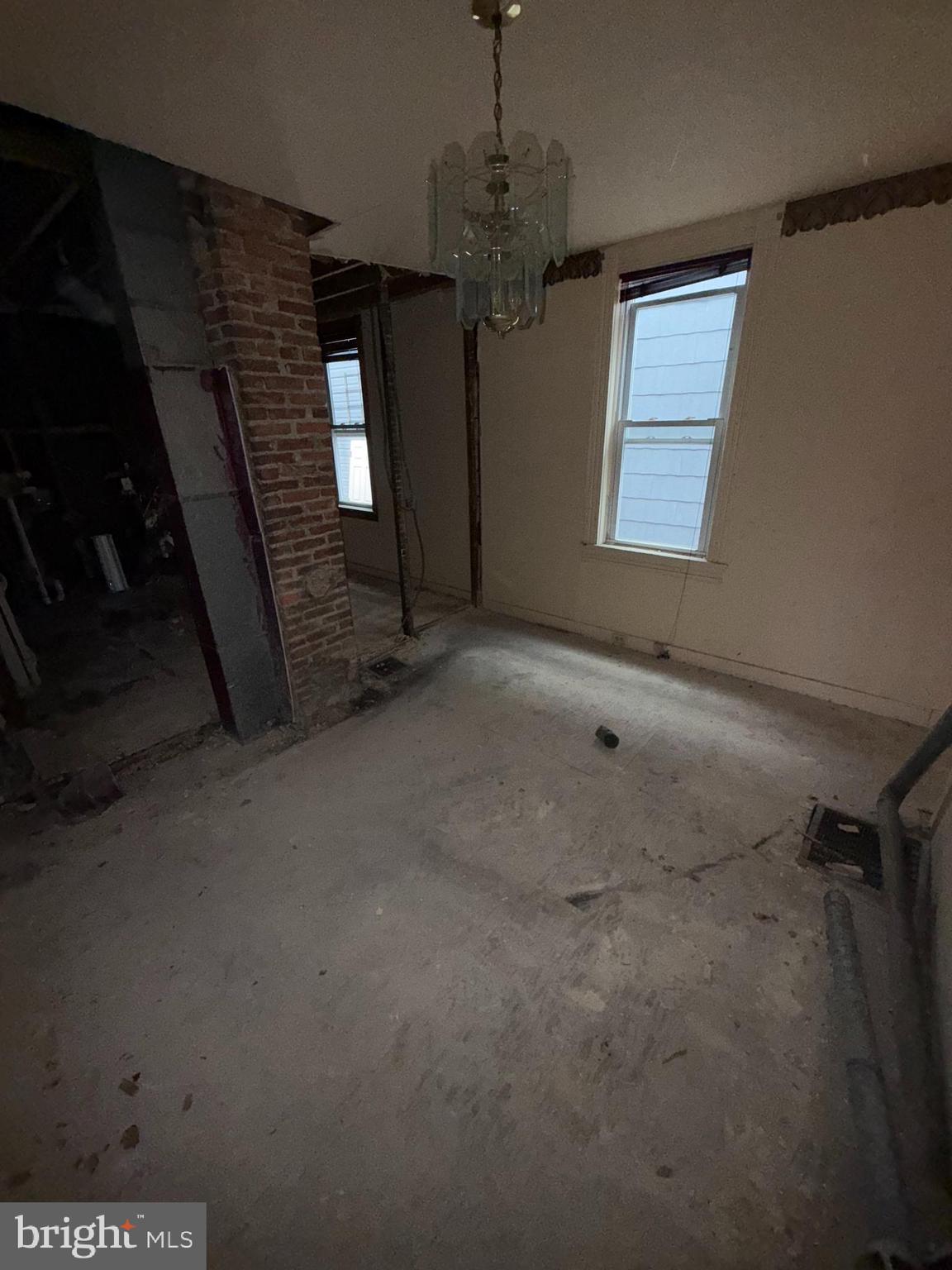 3113 Barclay Street Baltimore, MD 21218 - Photo 13 of 31 a view of empty room with windows