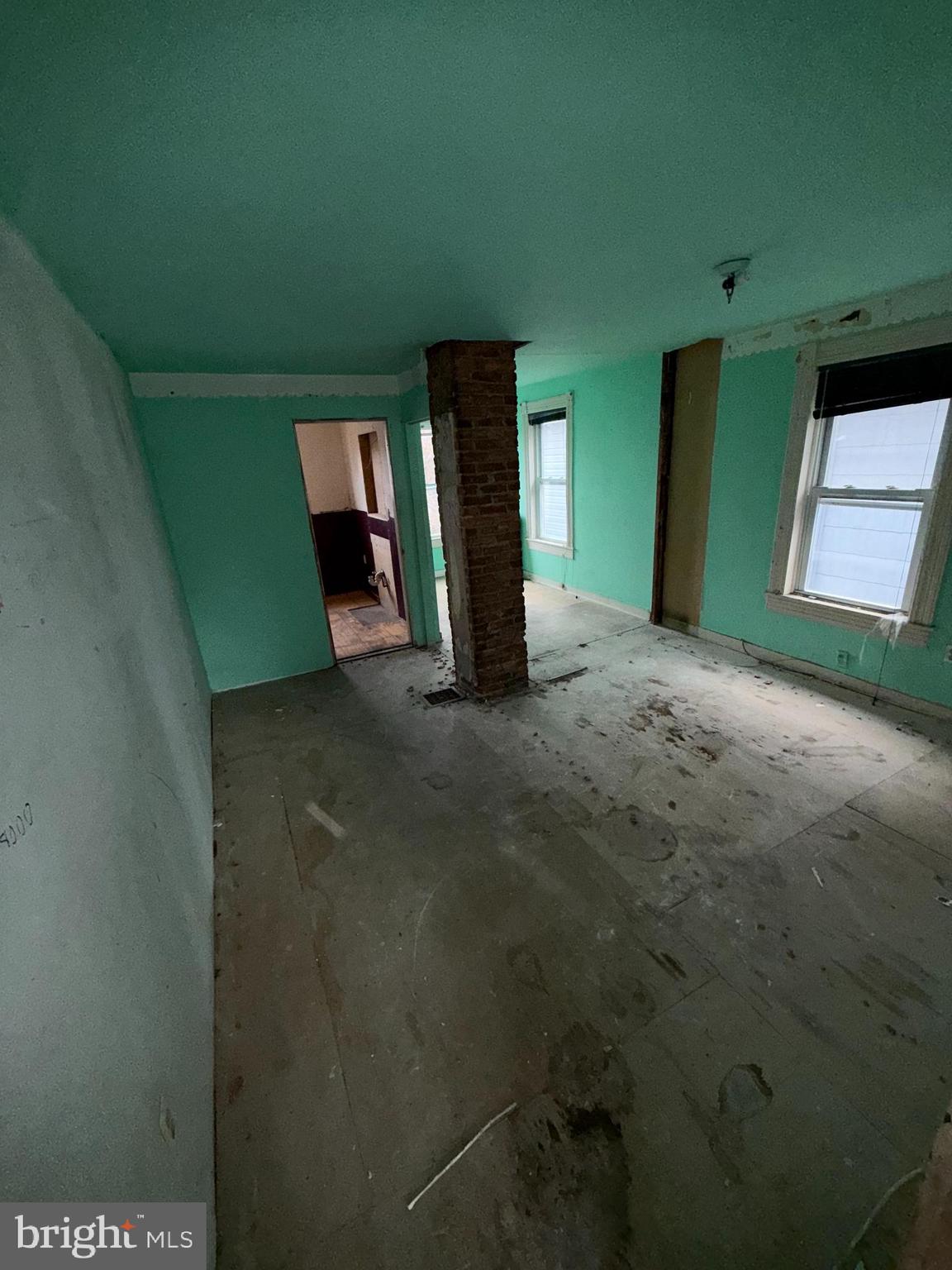 3113 Barclay Street Baltimore, MD 21218 - Photo 20 of 31 a view of a room with window and stairs