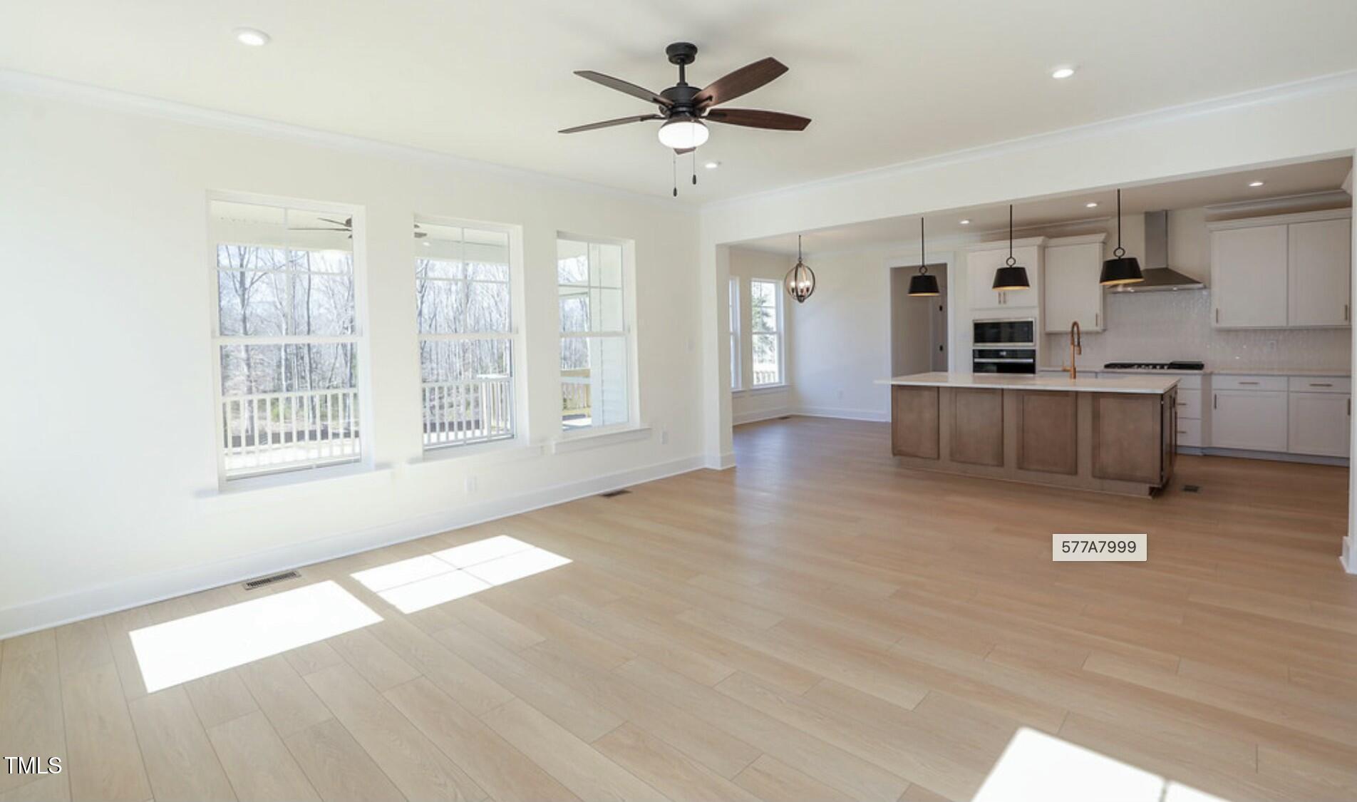 6 Tallulah Loop Cedar Grove, NC 27231 - Photo 11 of 17 wooden floor in an empty room with a window