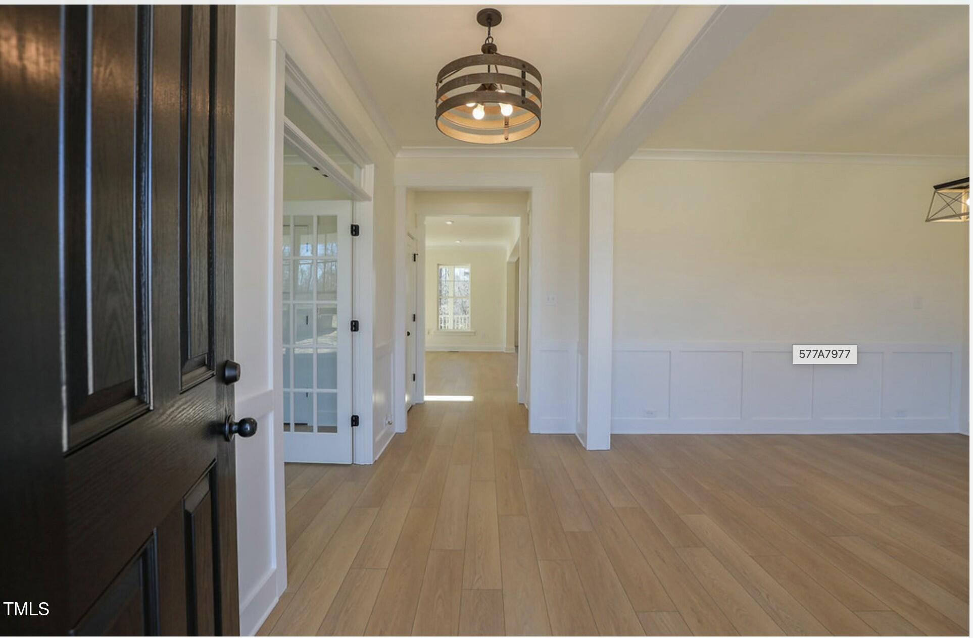 6 Tallulah Loop Cedar Grove, NC 27231 - Photo 13 of 17 a view of a hallway with wooden floor
