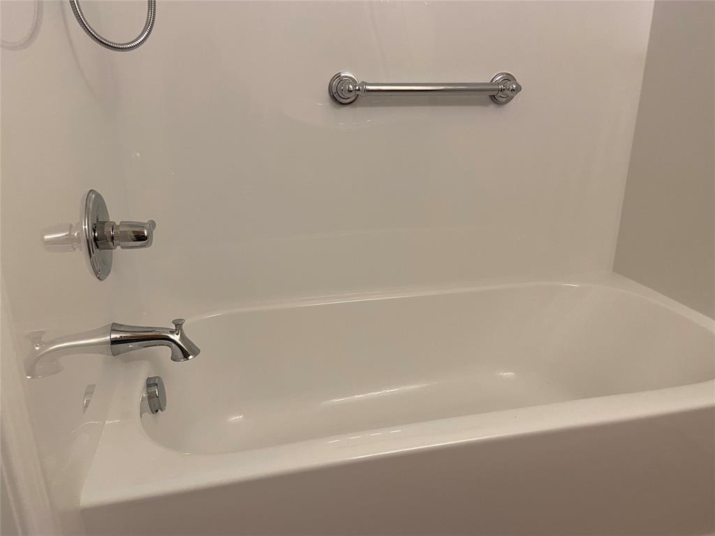 12800 Old San Antonio Road, Unit A Manchaca, TX 78652 - Photo 24 of 38 a close up of a bathtub