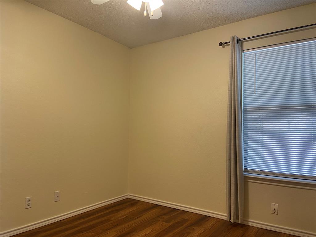 12800 Old San Antonio Road, Unit A Manchaca, TX 78652 - Photo 25 of 38 a view of small space with wooden floor