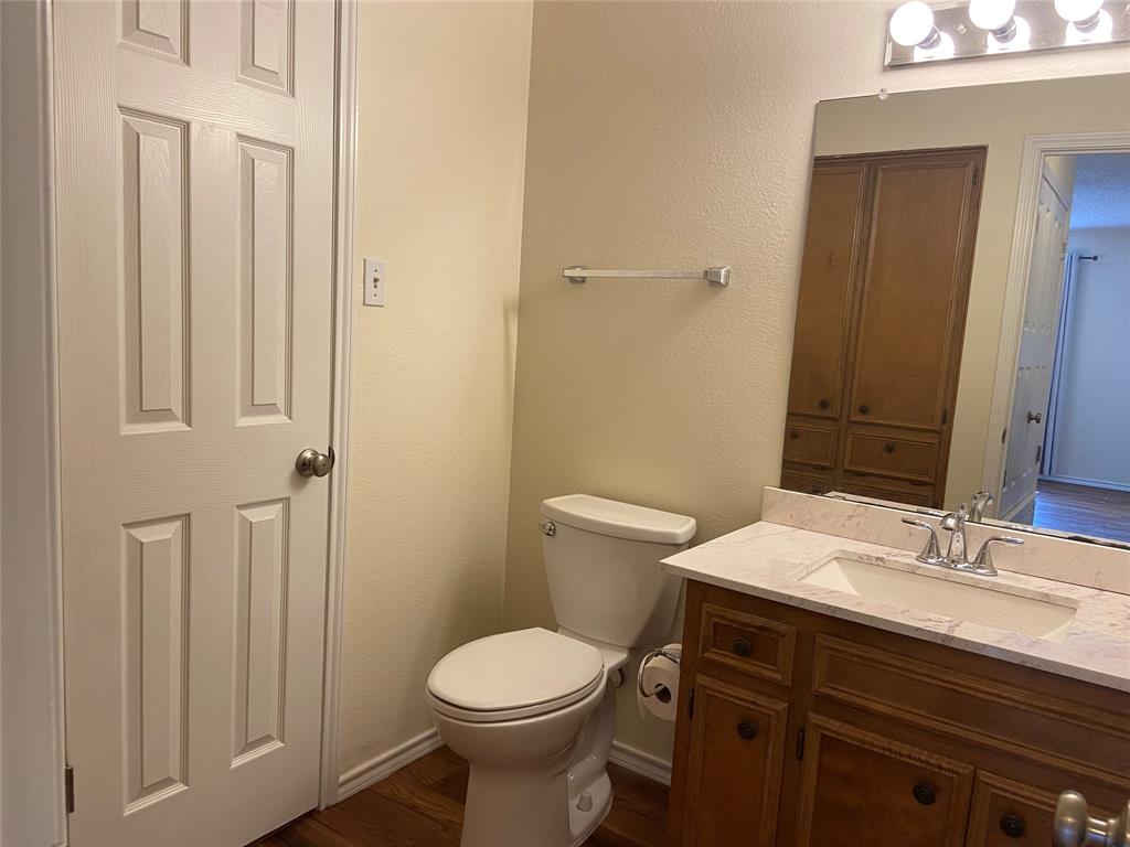 12800 Old San Antonio Road, Unit A Manchaca, TX 78652 - Photo 30 of 38 a bathroom with a sink a toilet and shower