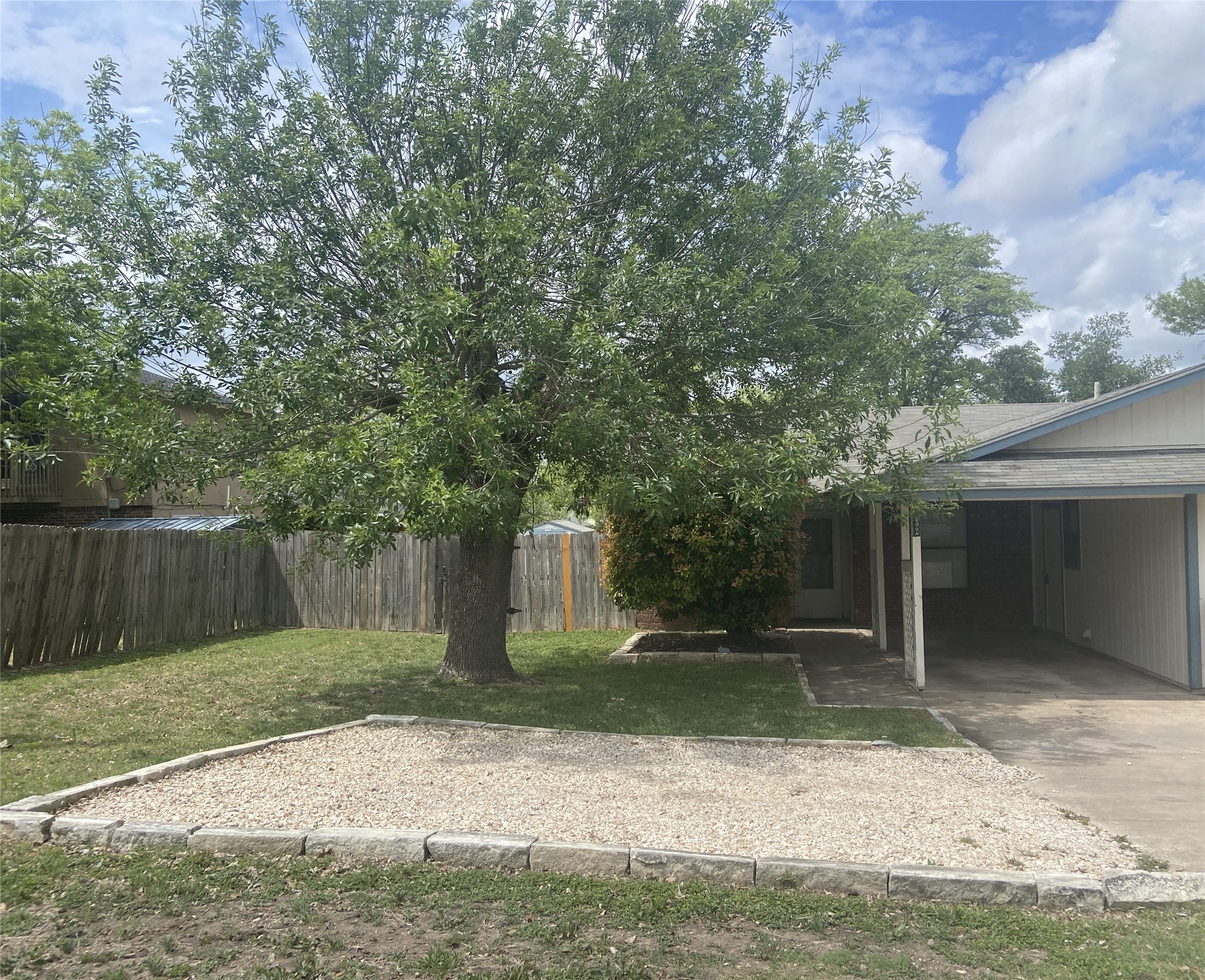 12800 Old San Antonio Road, Unit A Manchaca, TX 78652 - Photo 38 of 38 a backyard of a house