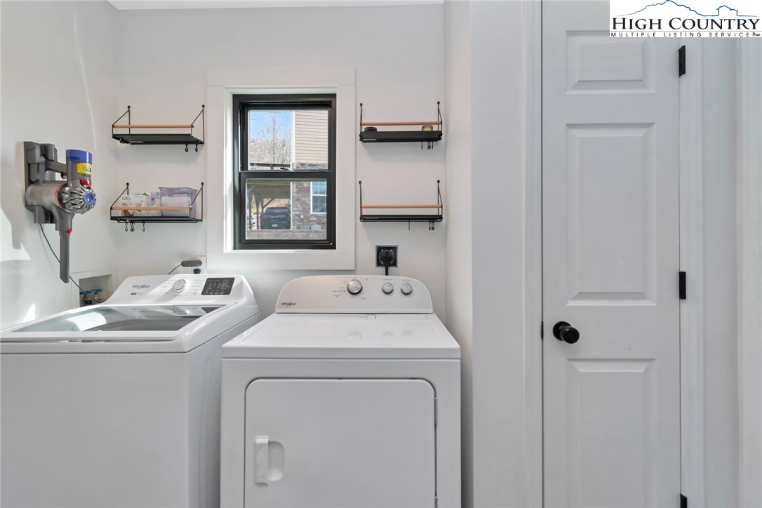 885 Alpine Drive Seven Devils, NC 28604 - Photo 42 of 50 a utility room with dryer and washer