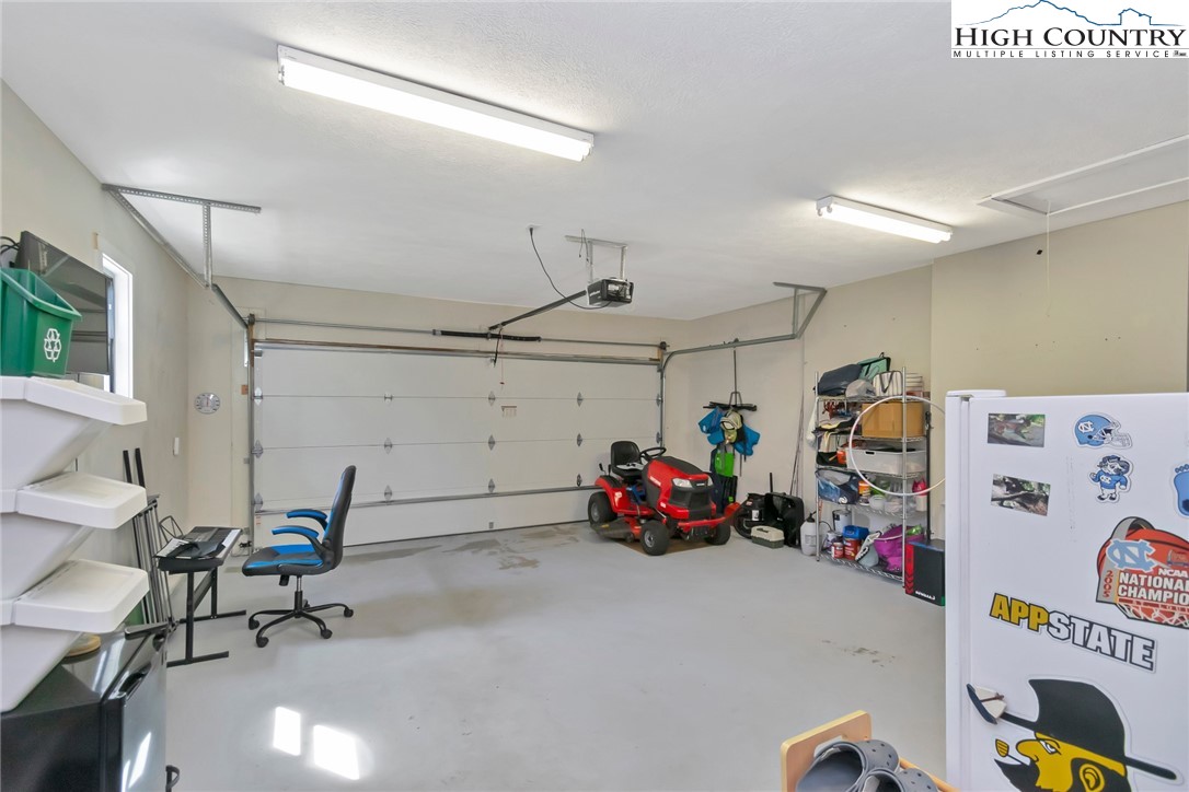 885 Alpine Drive Seven Devils, NC 28604 - Photo 44 of 50 a view of a garage with furniture