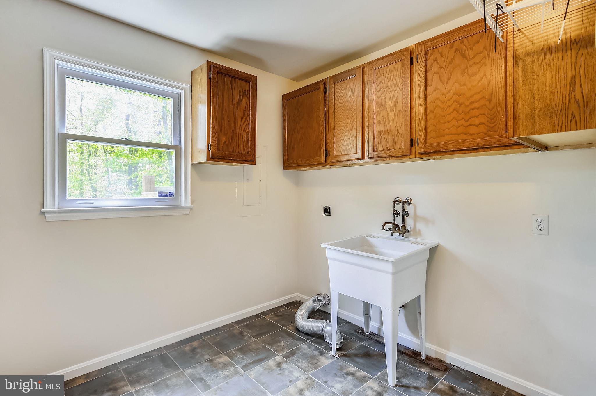 17009 Old Marshall Hall Road Accokeek, MD 20607 - Photo 14 of 38 Laundry room.