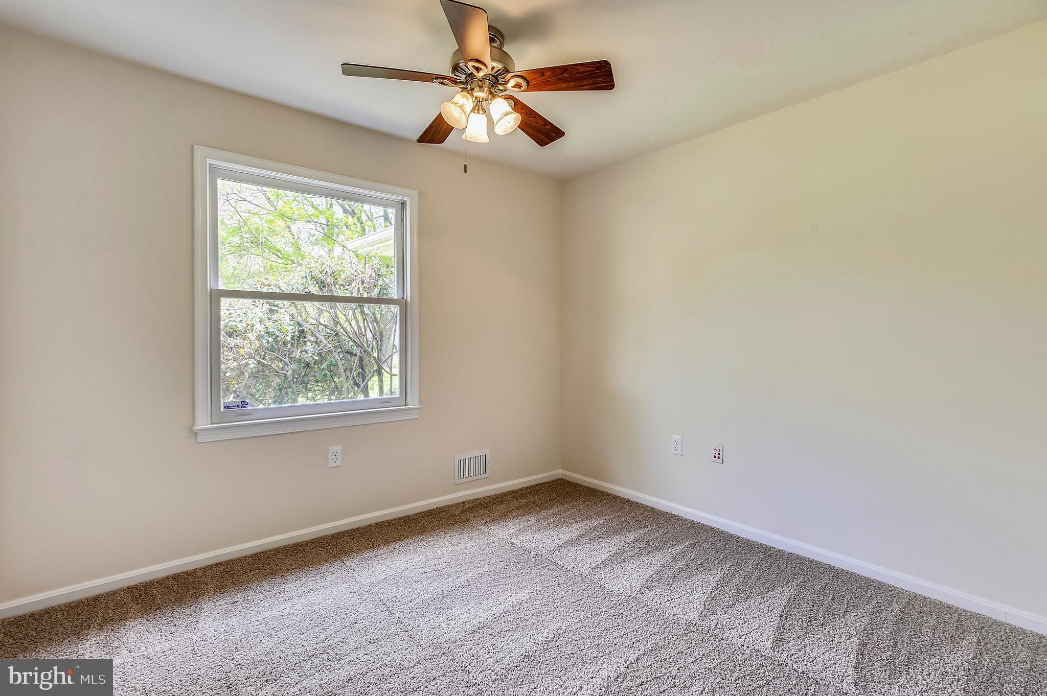 17009 Old Marshall Hall Road Accokeek, MD 20607 - Photo 22 of 38 Large windows, natural light.