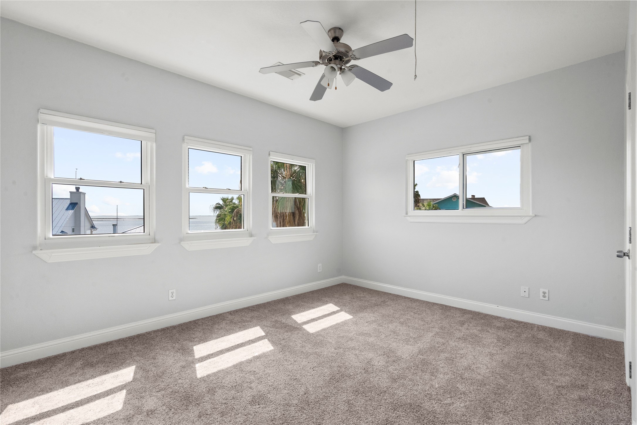138 Isles End Road Galveston, TX 77554 - Photo 20 of 36 a view of an empty room with a window