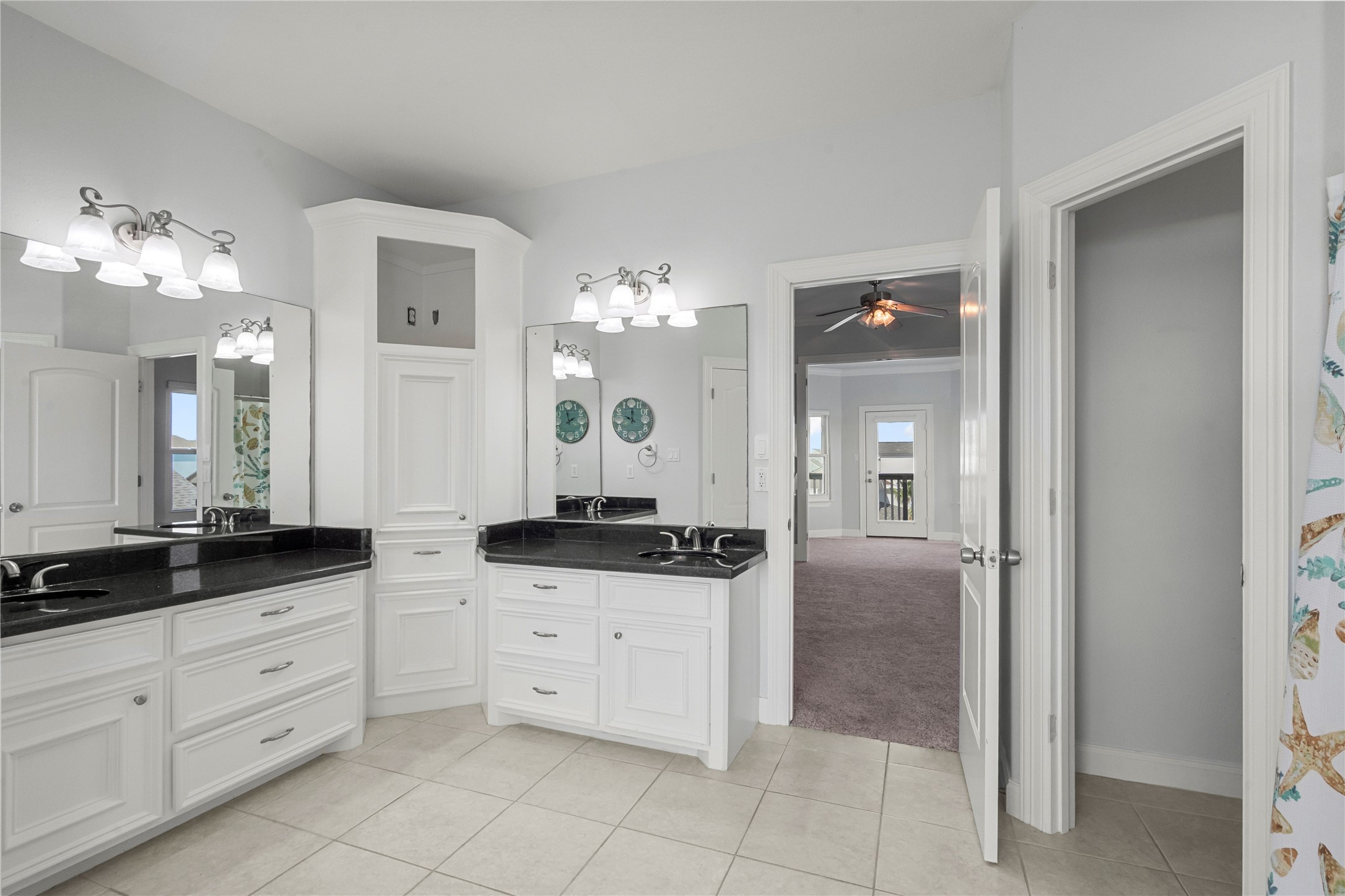 138 Isles End Road Galveston, TX 77554 - Photo 26 of 36 a kitchen with granite countertop a sink and cabinets