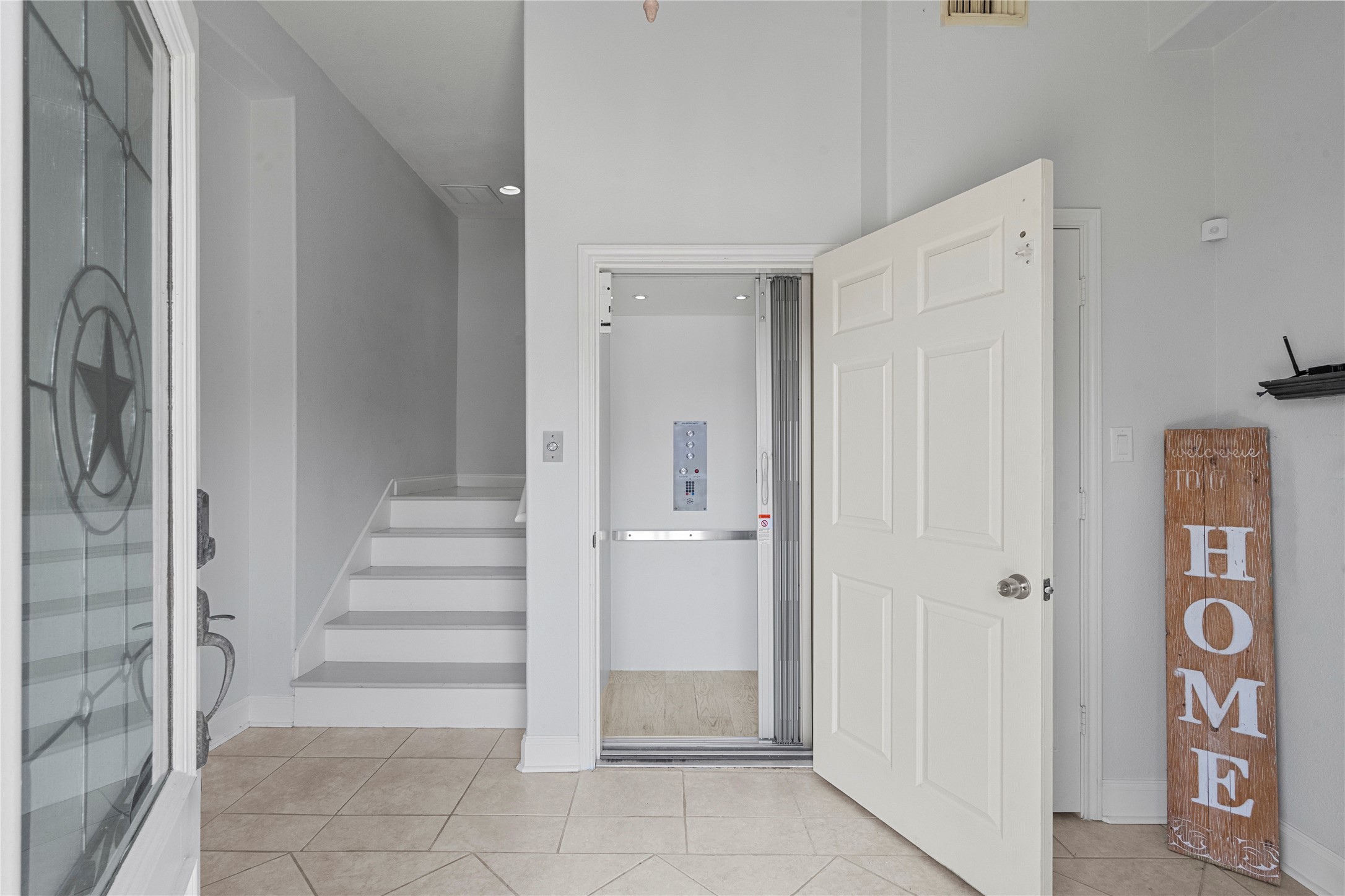 138 Isles End Road Galveston, TX 77554 - Photo 3 of 36 a view of a hallway with entryway and closet