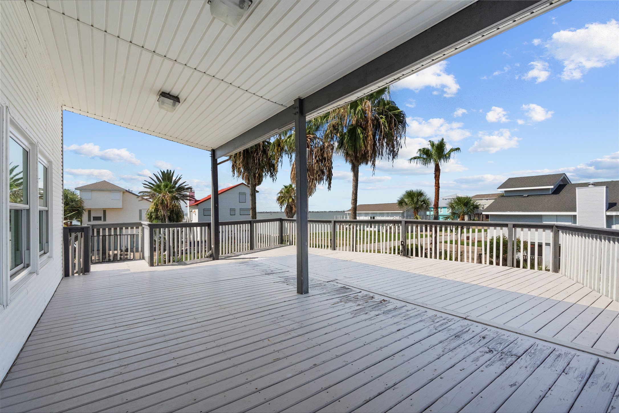 138 Isles End Road Galveston, TX 77554 - Photo 31 of 36 a view of outdoor space with deck