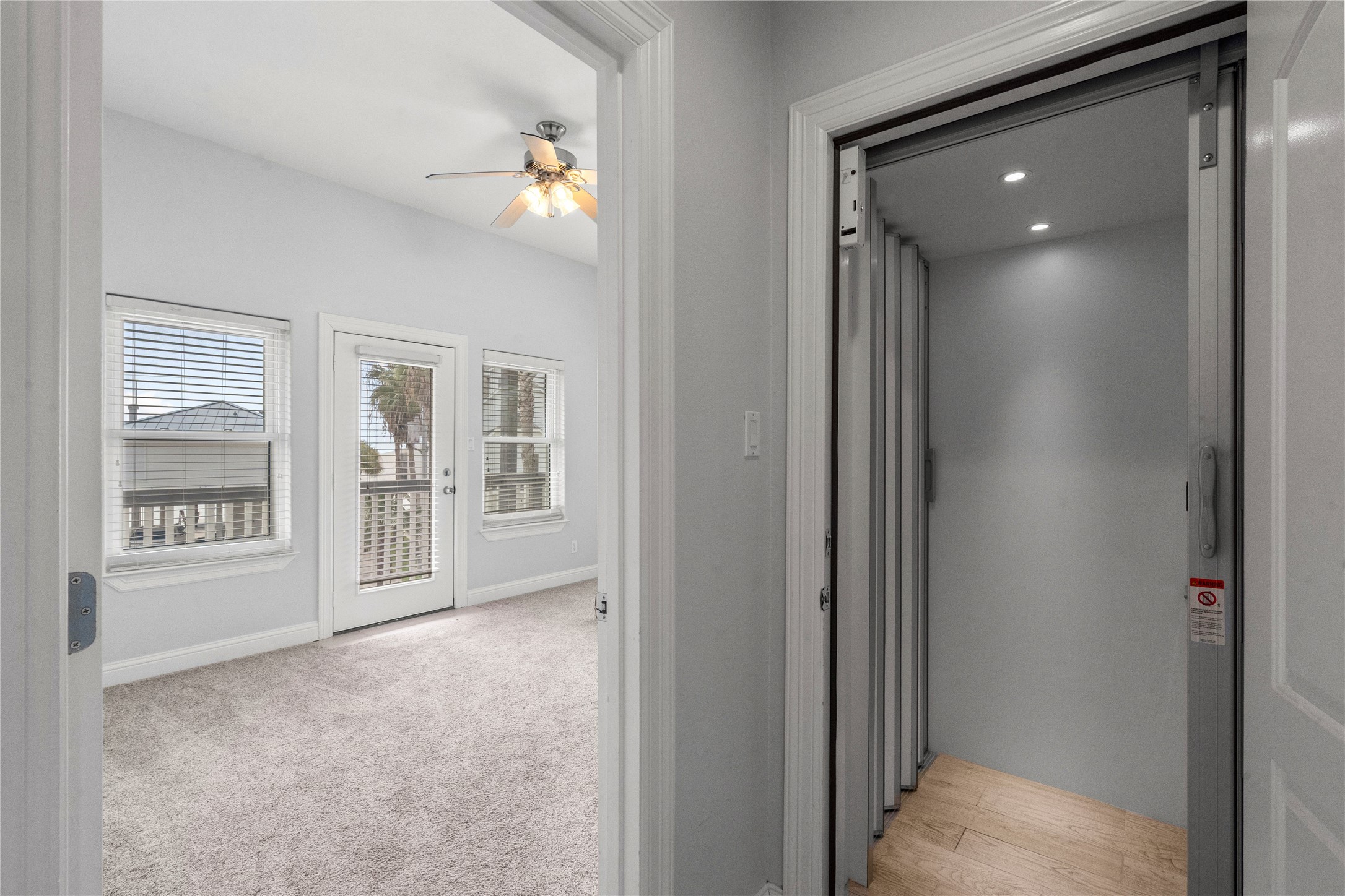 138 Isles End Road Galveston, TX 77554 - Photo 6 of 36 a view of an empty room with a window