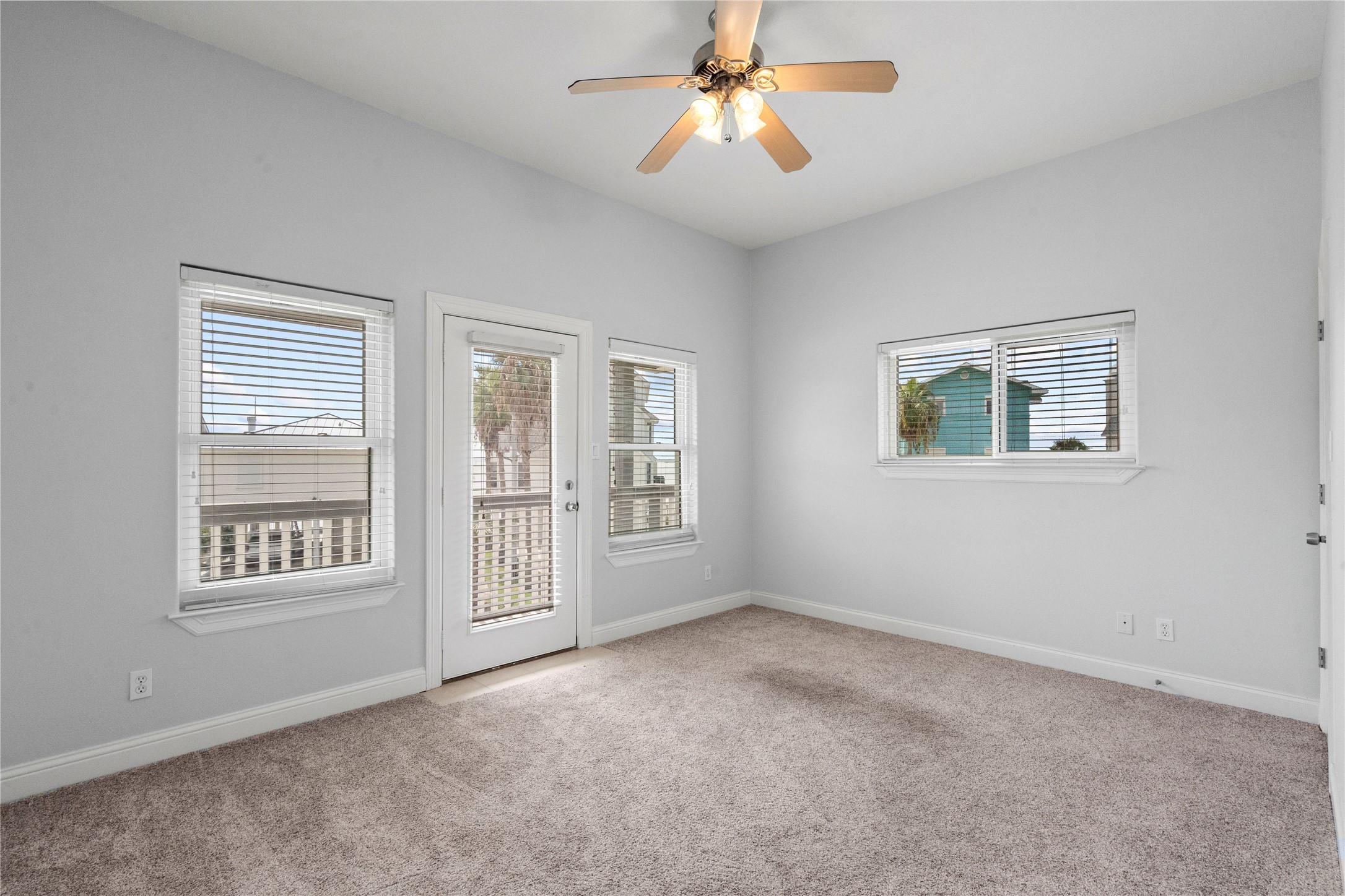 138 Isles End Road Galveston, TX 77554 - Photo 7 of 36 a view of an empty room with a window