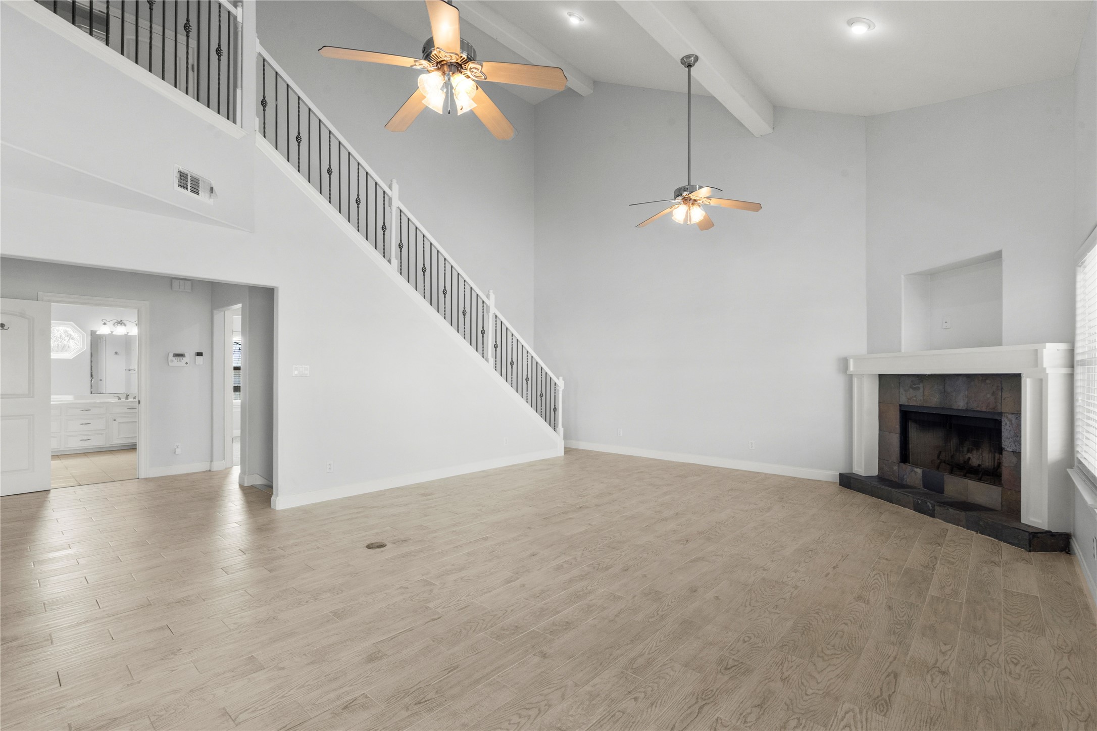 138 Isles End Road Galveston, TX 77554 - Photo 10 of 36 a view of an empty room with a fireplace