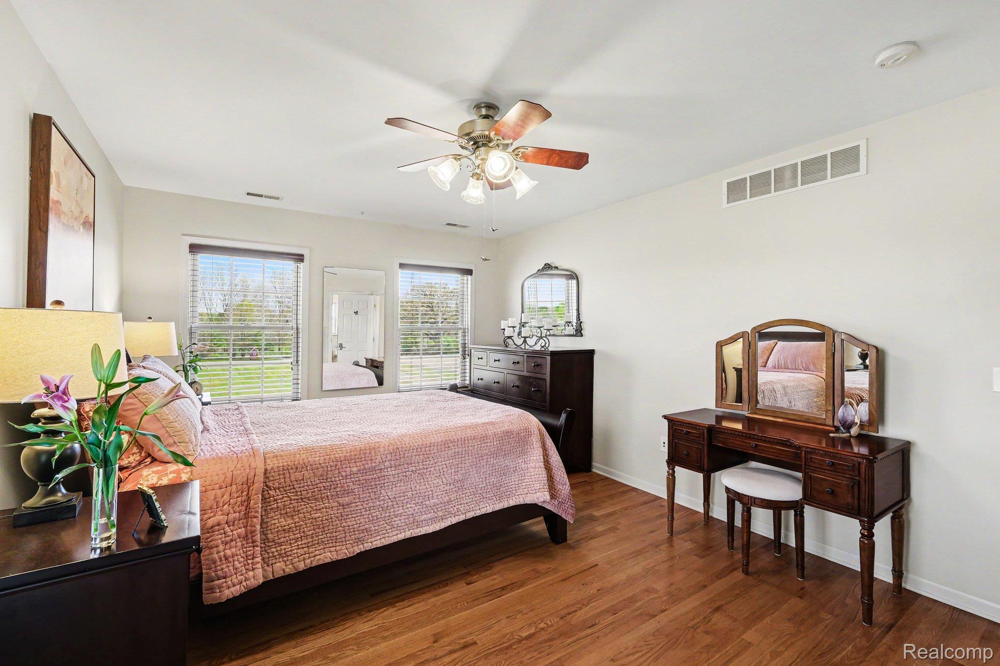 6520 Cook Road Swartz Creek, MI 48473 - Photo 25 of 43 Bedroom with wood finished floors and ceiling fan