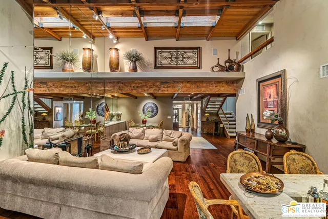a bathroom with a granite countertop sink double vanity and a mirror