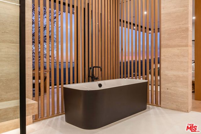 a view of a bathtub in a bathroom