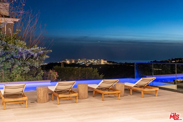 an outdoor space with furniture