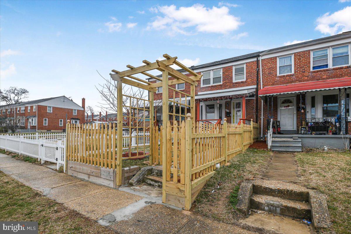403 Torner Road Baltimore, MD 21221 - Photo 3 of 28 a view of a building with a balcony