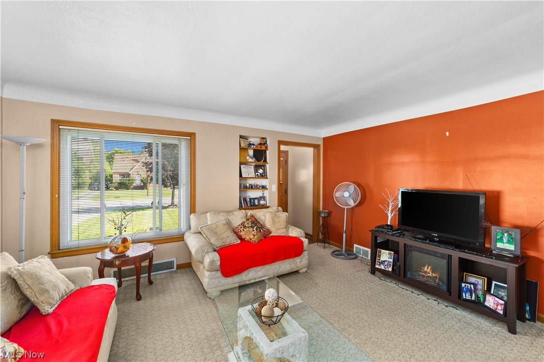 16650 Libby Road Maple Heights, OH 44137 - Photo 5 of 25 View of carpeted living room