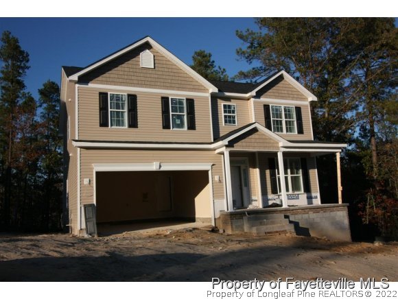 209 Culpepper Road Cameron, NC 28326 - Photo 1 of 17 a front view of a house with a yard