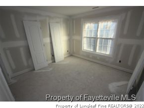 209 Culpepper Road Cameron, NC 28326 - Photo 15 of 17 a view of an empty room with a window