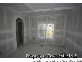 209 Culpepper Road Cameron, NC 28326 - Photo 5 of 17 a view of an empty room with a window