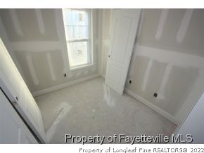 209 Culpepper Road Cameron, NC 28326 - Photo 10 of 17 a view of empty room with window