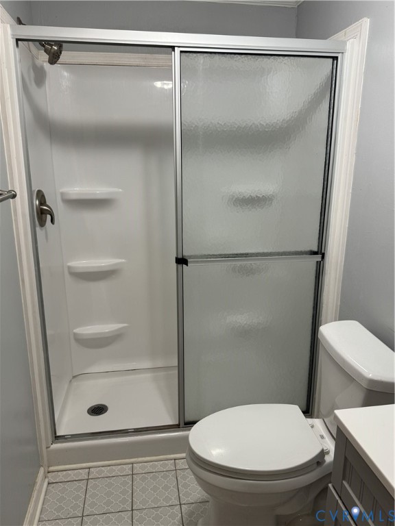 371 Horseshoe Road Jarratt, VA 23867 - Photo 15 of 21 a bathroom with a glass shower door