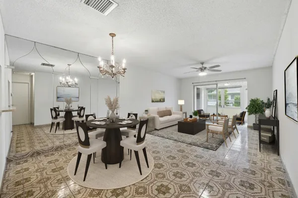 a view of a dining room with furniture