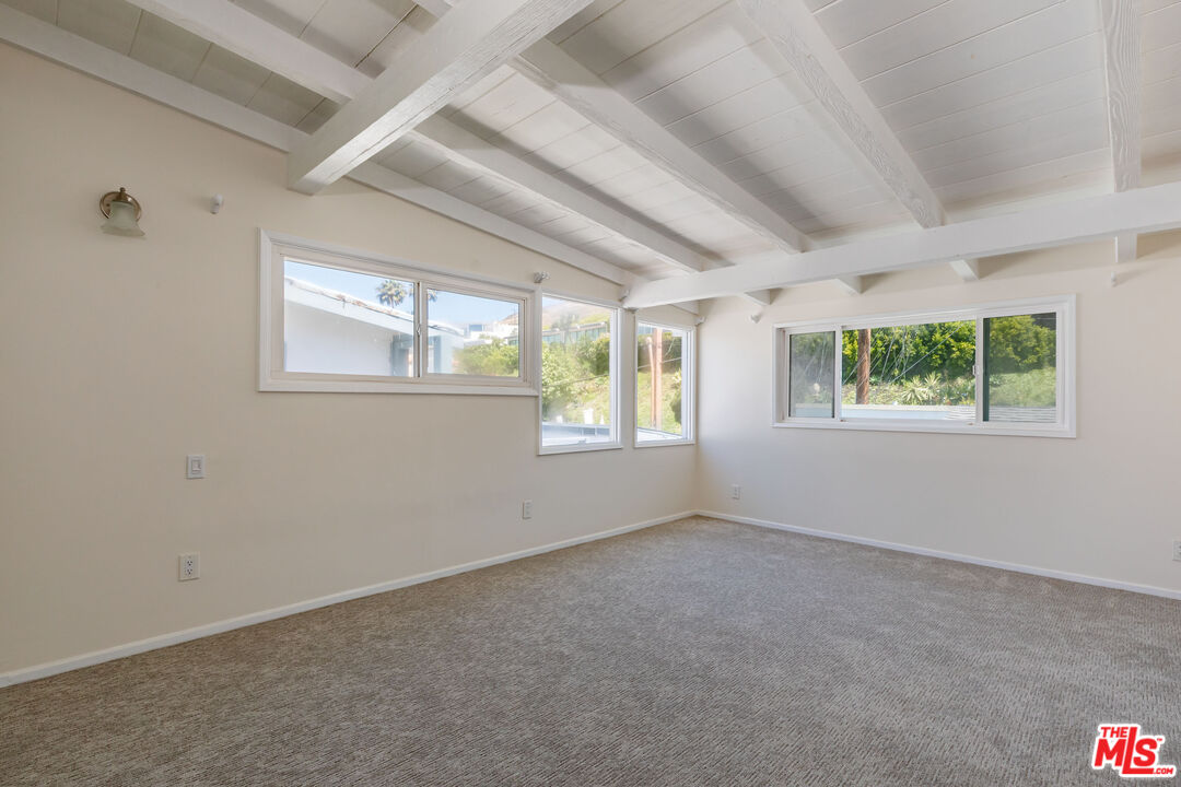25408 Malibu Road, Unit 1/2 Malibu, CA 90265 - Photo 13 of 19 an empty room with windows