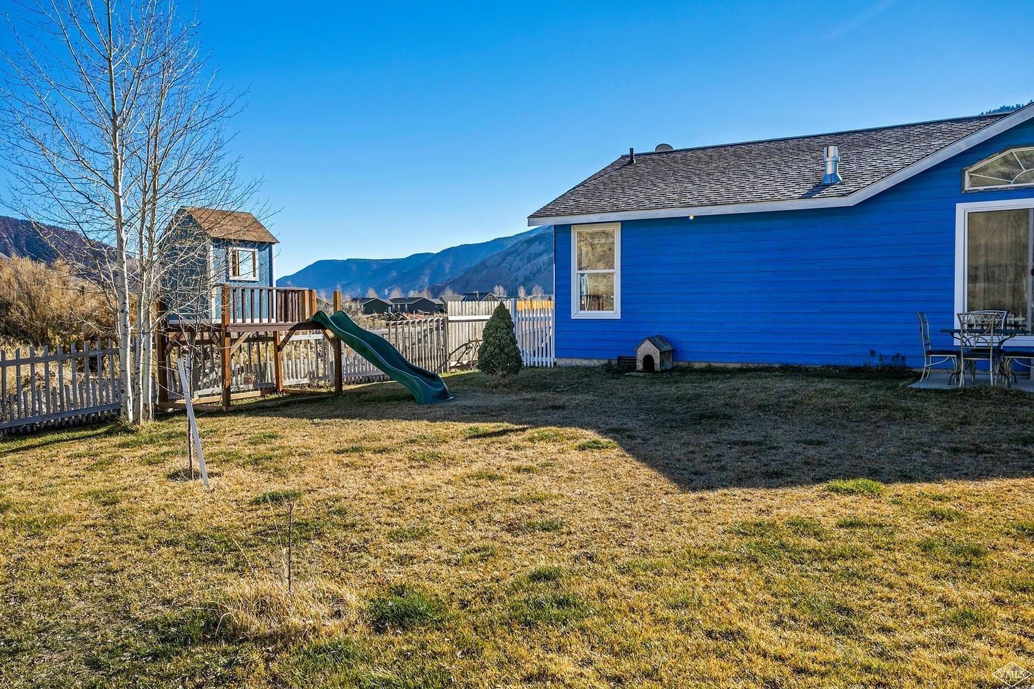 102 Cut Throat Loop Gypsum, CO 81637 - Photo 20 of 25 a view of a house with a yard