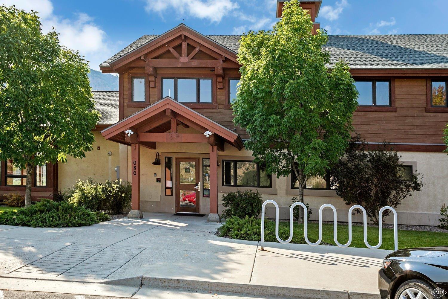 102 Cut Throat Loop Gypsum, CO 81637 - Photo 22 of 25 a front view of a house with a garden