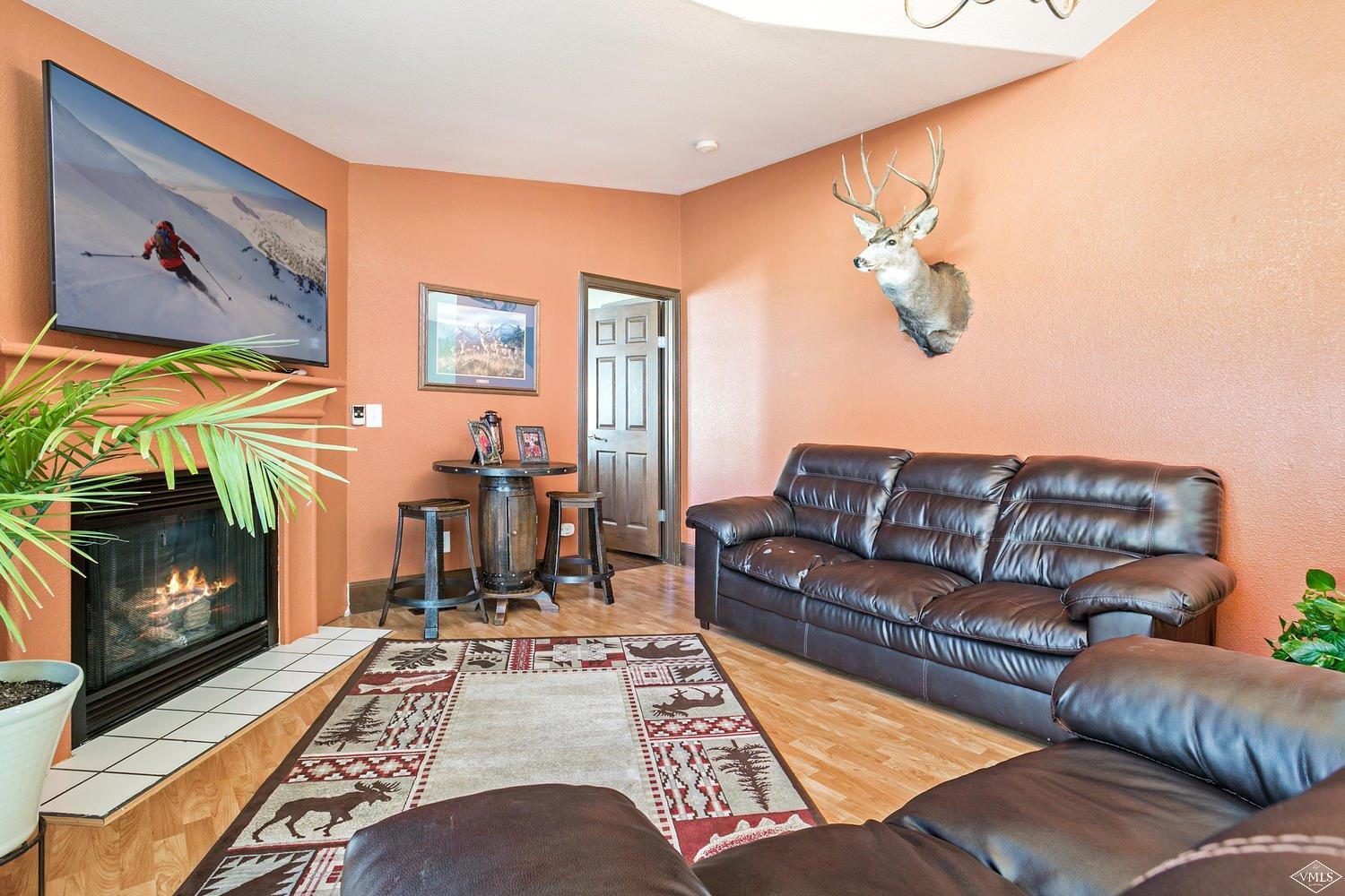 102 Cut Throat Loop Gypsum, CO 81637 - Photo 3 of 25 a living room with furniture and a fireplace