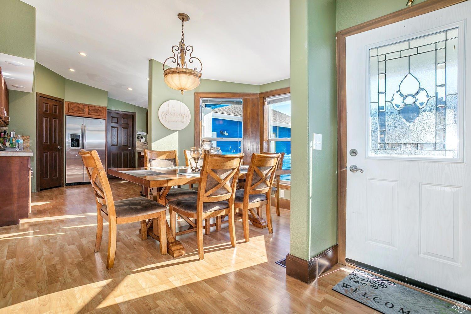 102 Cut Throat Loop Gypsum, CO 81637 - Photo 5 of 25 a very nice looking dining room with a large window and cabinets