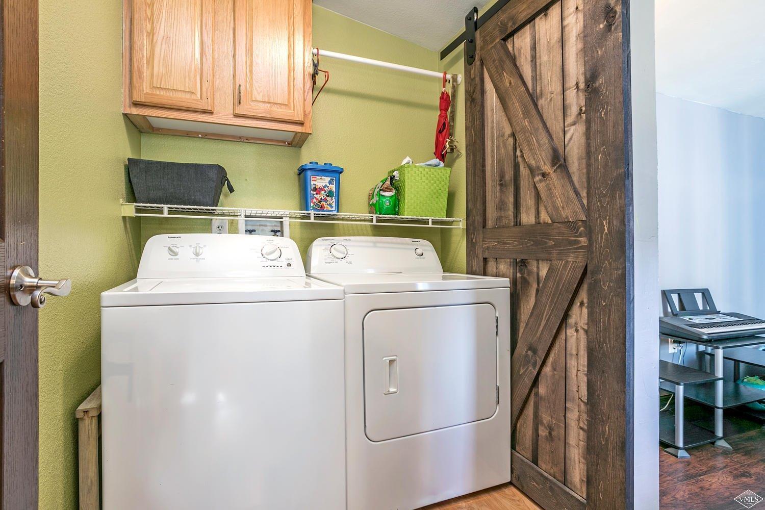 102 Cut Throat Loop Gypsum, CO 81637 - Photo 10 of 25 a utility room with dryer and washer