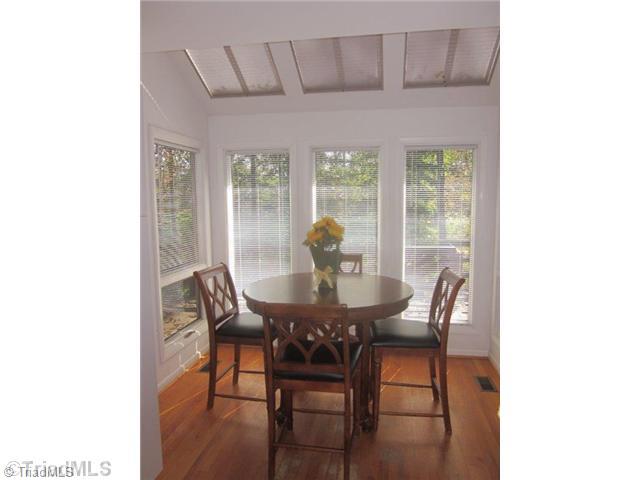 671 Lake Lemar Road Reidsville, NC 27320 - Photo 11 of 16 Breakfast. Breakfast nook with skylights. Enjoy your morning coffee and watch the birds!