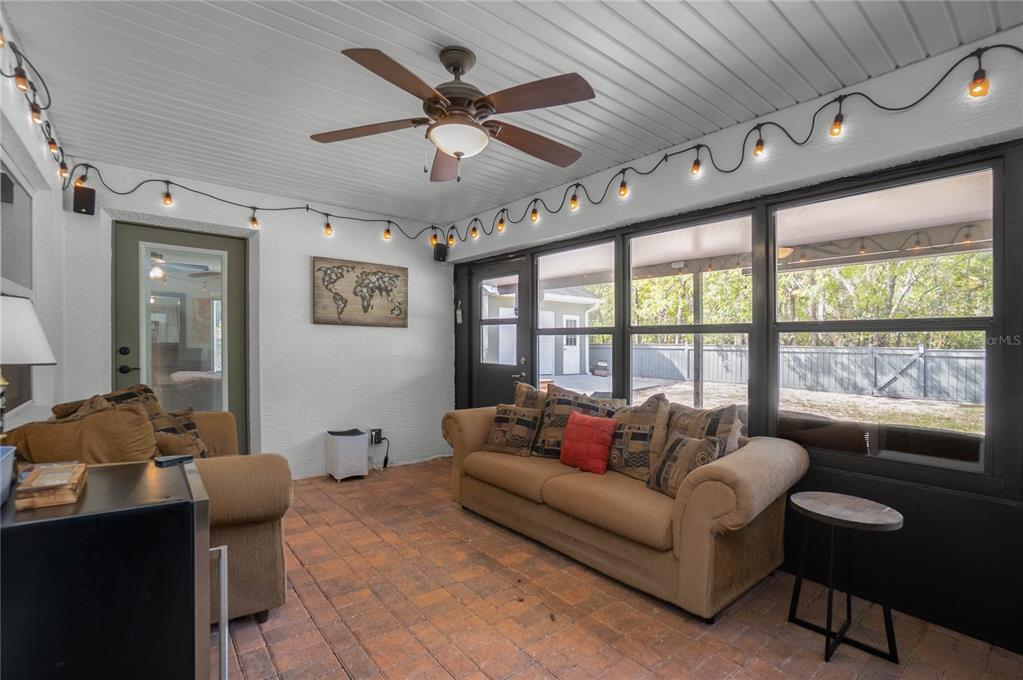5466 West Tortuga Loop Lecanto, FL 34461 - Photo 29 of 41 a living room with furniture and a large window