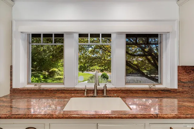 a view of room with window and fireplace
